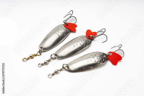 Artificial baits for catching of the predatory fishes on white background