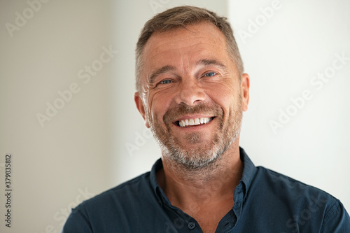 Portrait of happy mature man smiling