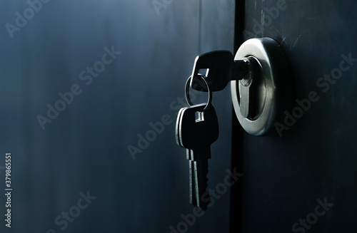 Selective focus/Keys stuck in a lock with door.