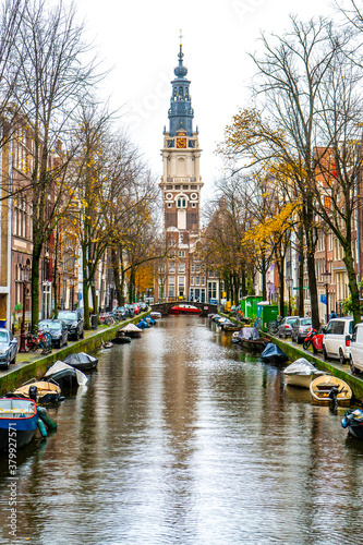 Beautiful canals and buildings near Nieuwmarkt in Amsterdam , Netherlands