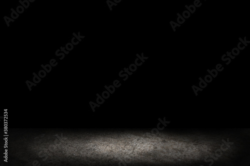 Dark room with cement, concrete floor. black wall cement for product show with Elegant light background and texture. Abstract studio black room gradient background.