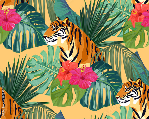 Tropical seamless pattern. Palm tree leaves, flower hibiscus and tiger. Vector illustration. Summer background