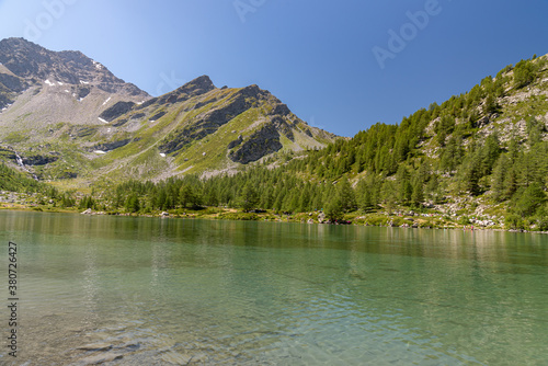 Morgex (Aosta), the wonderful Lake of Arpy, a mirror of water of glacial origin set in a beautiful alpine setting.