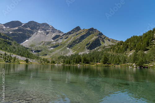 Morgex (Aosta), the wonderful Lake of Arpy, a mirror of water of glacial origin set in a beautiful alpine setting.