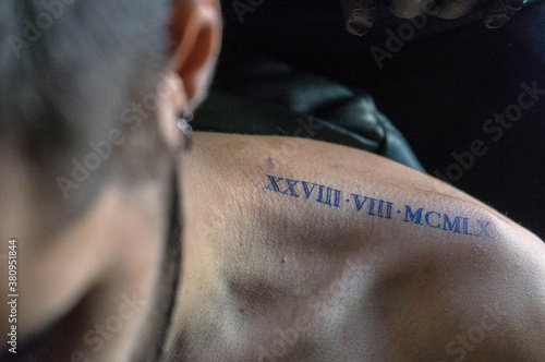 Closeup shot of a cool tattoo on a man's shoulder