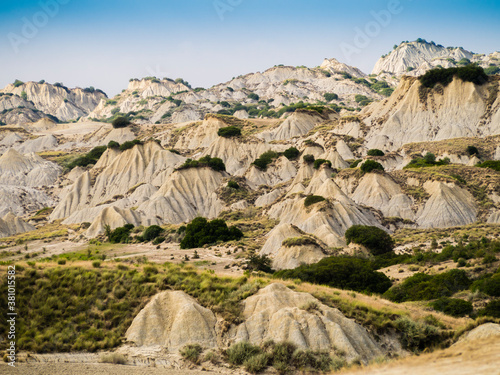 Dramatic view of Aliano badlands (calanchi), lunar landscape made of clay sculptures eroded by the rainwater, Basilicata region, southern Italy 