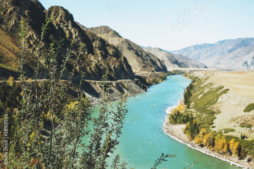 View of the turquoise river Katun and the Altai mountains, autumn season