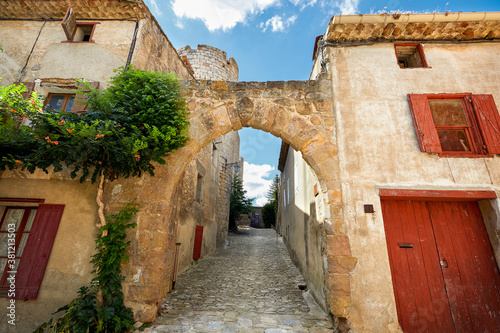 Arched street in the medieval village of Villerouge-Termenes, South of France