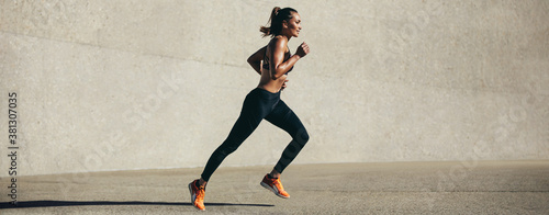 Healthy young woman on morning run