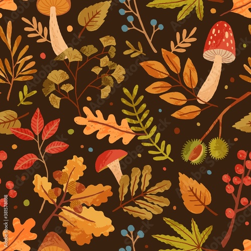 Seamless pattern decorated with autumn leaves, forest mushrooms and tree branches. Repeatable seasonal background with chestnut, berries, acorn and foliage. Flat vector illustration of rowanberries