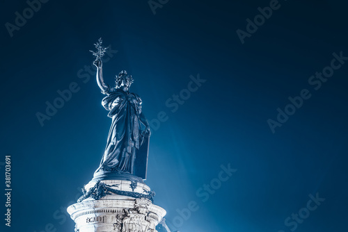 Monument à la République at the center of The Place de la République square, topped by a statue of Marianne in Paris, France