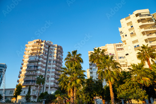 Modern and new apartment building and blue sky background