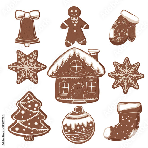 A set of different Christmas gingerbread cookies with glaze. Bell, man, house, sock, snowflakes, tree, ball and mitten.