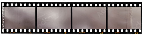 real scan of 35mm film strip or film material isolated on white background, just blend in your own content to make it look old and vintage 