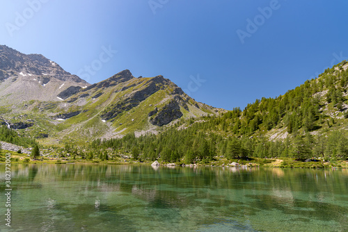 Morgex (Aosta), the wonderful Lake of Arpy, a mirror of water of glacial origin set in a beautiful alpine setting.