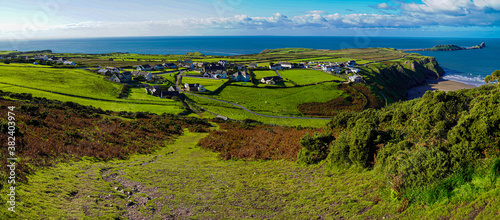 Gower Peninsular Rhossilli Bay Panoramic with Green Hills surrounding the Sandy Bay - Green Welsh Hillsides