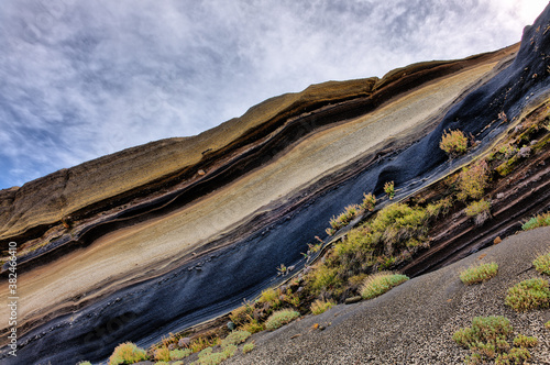 At the Tarta del Teide viewpoint, there is an open eruption of rocks with layers of lava ash in fascinating colors, which have caused various volcanic eruptions on the Atlantic island of Tenerife.