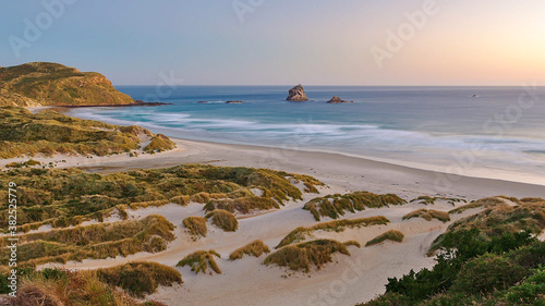 Long exposure sunset at Sandfly Bay beach, Dunedin, New Zealand