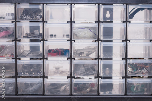 Plastic box tool organizer for nails, screws, bolts and other details.