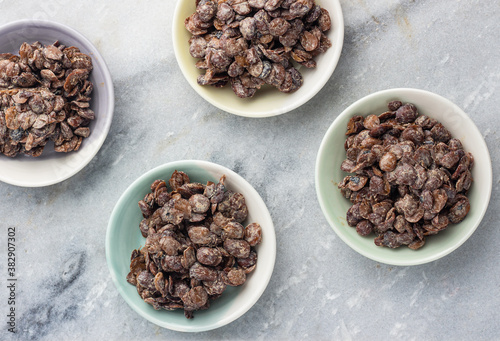 Fermented locust beans in small bowls