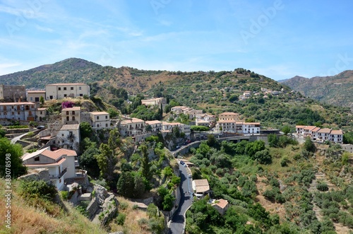 Medieval mountain village of Savoca in Sicily with its Bar Vitelli in centre, known as movie location of Godfather, a sunny day in summer, panoramic view