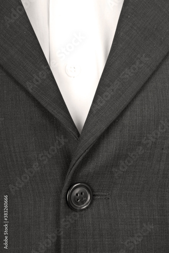 Button on the suit. Suit fabric