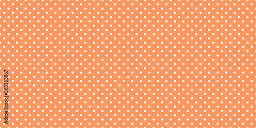 seamless pattern with dots on melon background color. white small polka dot on orange melon background color