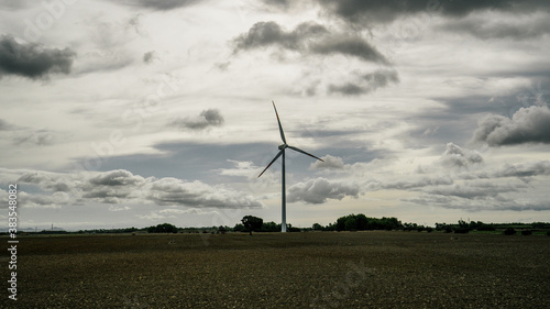  wind turbine with a cloudy and gray sky, villacidro, south sardinia