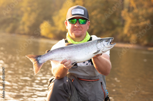 fisherman with a silver salmon 