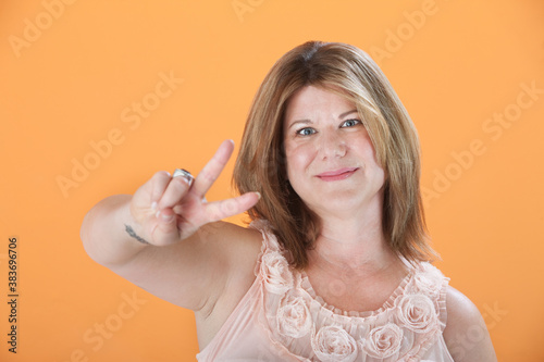 Woman Shows The Victory Symbol