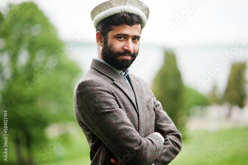 Beard afghanistan man wear pakol hat and jacket.