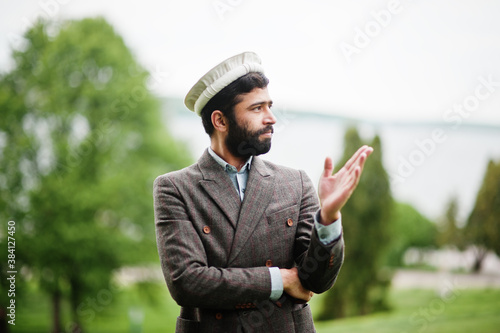 Beard afghanistan man wear pakol hat and jacket.