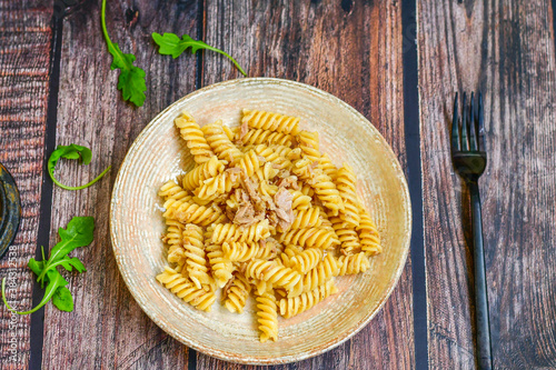  Italian home made fusilli pasta with tuna fish, parmesan cheese and black pepper .