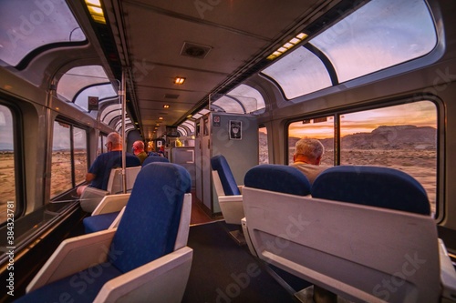 Amtrak Train crossing through the Colorado Rocky Mountains with peak Fall Colors in September