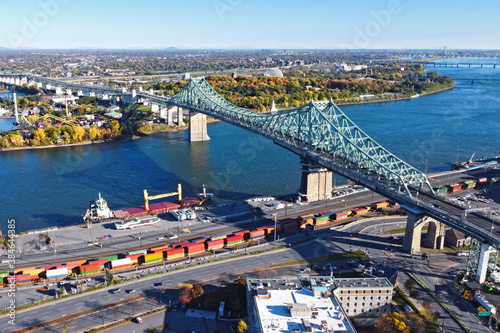 Montreal Jacques Cartier bridge with colourful autumn leaves