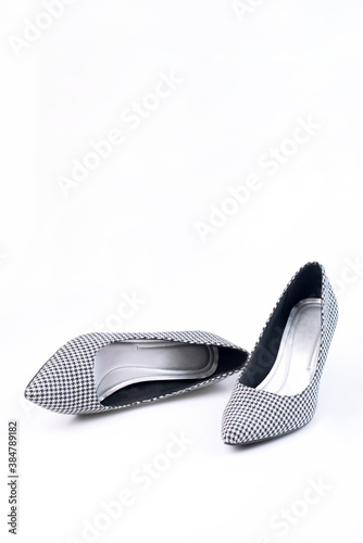 women's retro shoes with black and white pattern on heels isolated on a white background