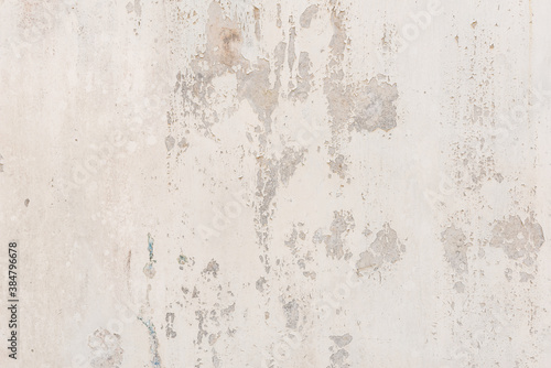 white white background and texture of peeling paint on plaster wall because old paint expired.