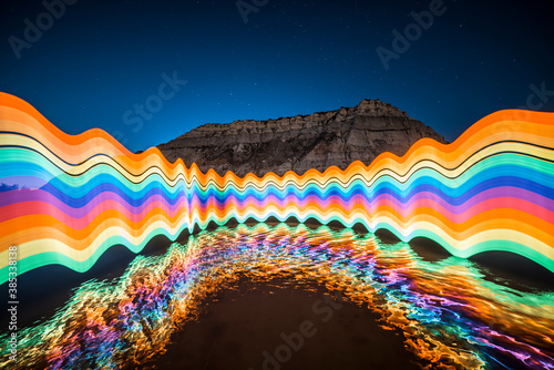 Light Painted Rainbow Reflected on River, Long Exposure Photography