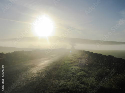 sunrise and mist over the valley.