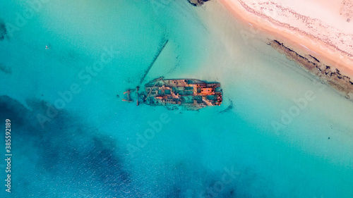 Drone pics over a shipwreck next to a tropical beach in Epanomi, Macedonia, Greece