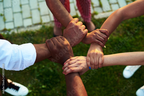 Black people with hands joined. Black people support each other.