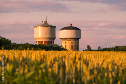 Water towers in Hamm Berge with a cornfield in the Ruhrgebiet in Germany