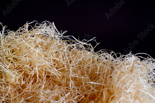 Wood wool. Filling material for packaging. Easily shapable, suitable for restoring furniture, lining parcels, decorating. 