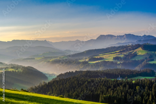 Panoramic view over the alps and hills of the emmental valley