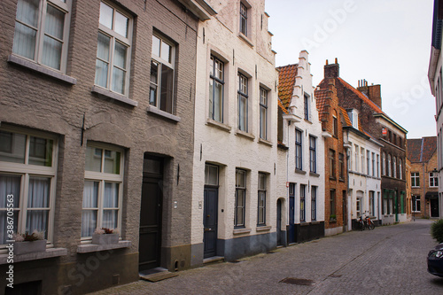 Bruges, Belgium - May 12, 2018: Unique Street With Medieval Houses