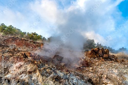 Geysers also known as "soffioni boraciferi" with sulphurous steams used to produce geothermal energy, in the nature park of the Biancane, Monterotondo Marittimo, near Larderello, Tuscany, Italy