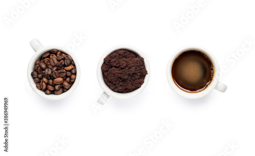 composition with cups of coffee beans, ground and black coffee