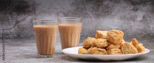 indian khari or kharee or salty Puff Pastry Snacks, served with indian hot tea.