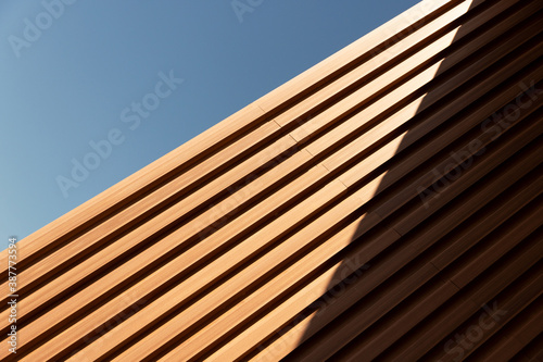 line of wood in detail building and blue sky abstract architecture background