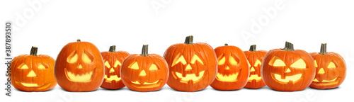 Set of carved Halloween pumpkins on white background. Banner design